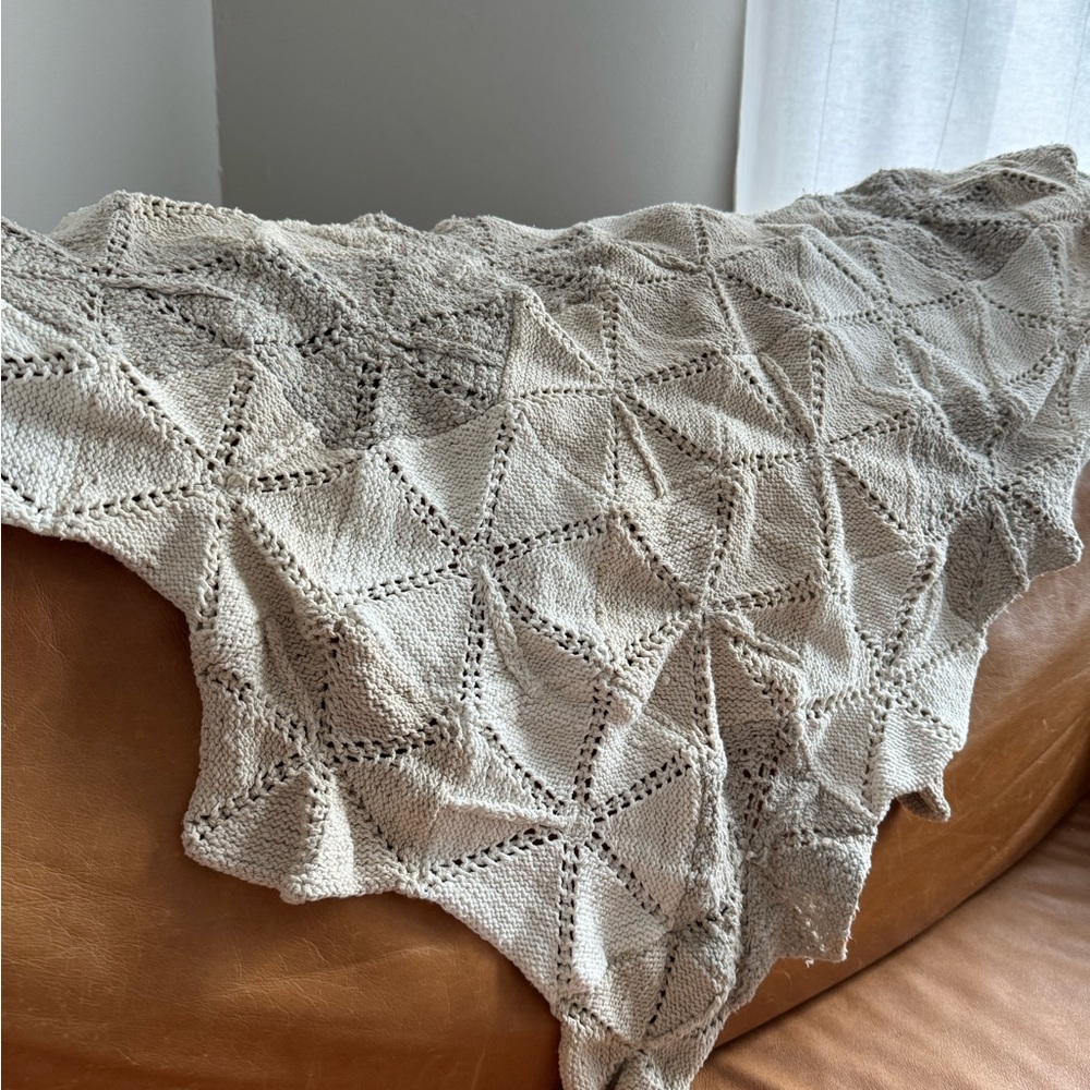 Crocheted neutral throw blanket